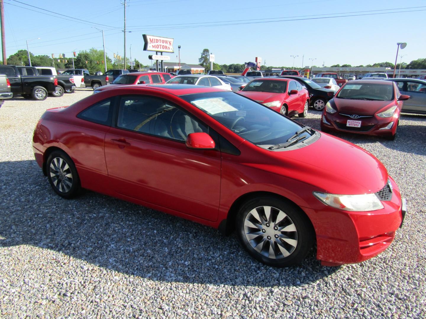 2009 Red /Gray Honda Civic EX Coupe 5-Speed AT (2HGFG12839H) with an 1.8L L4 SOHC 16V engine, Automatic transmission, located at 15016 S Hwy 231, Midland City, AL, 36350, (334) 983-3001, 31.306210, -85.495277 - Photo#0